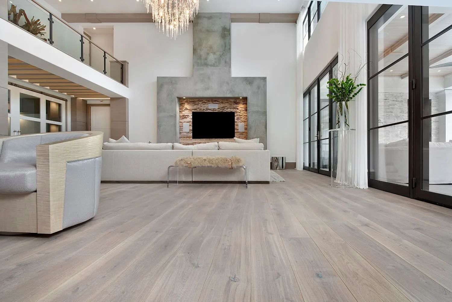 Pale European oak floors in a two-story living room