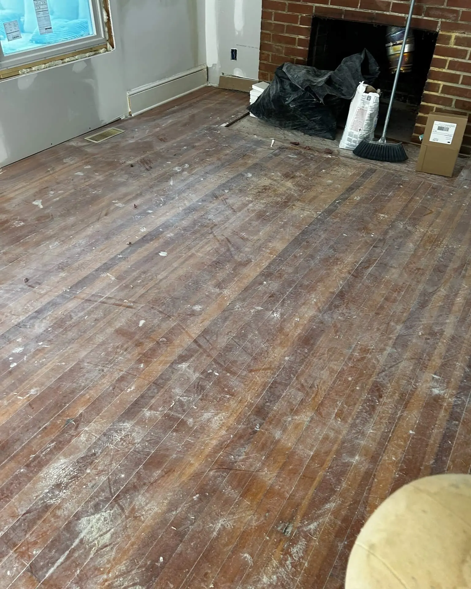 Worn reclaimed fir floor before refinishing