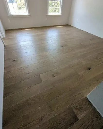 Prefinished white oak floor in a bright living room