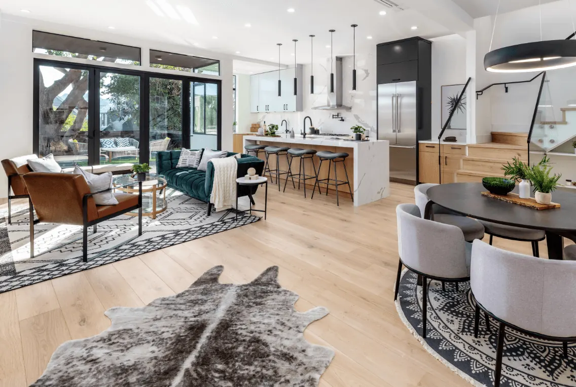 Light European oak through an open living and dining room